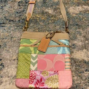 Coach *Used* milt-colored slightly stained (can be wiped clean)